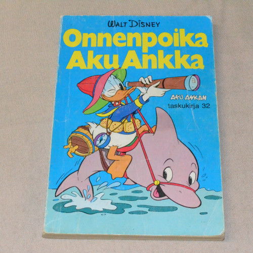 Aku Ankan taskukirja 32 Onnenpoika Aku Ankka (1.p.)